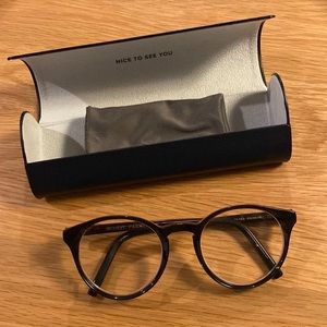 Warby Parker Briggs black prescription lenses with cloth and case.